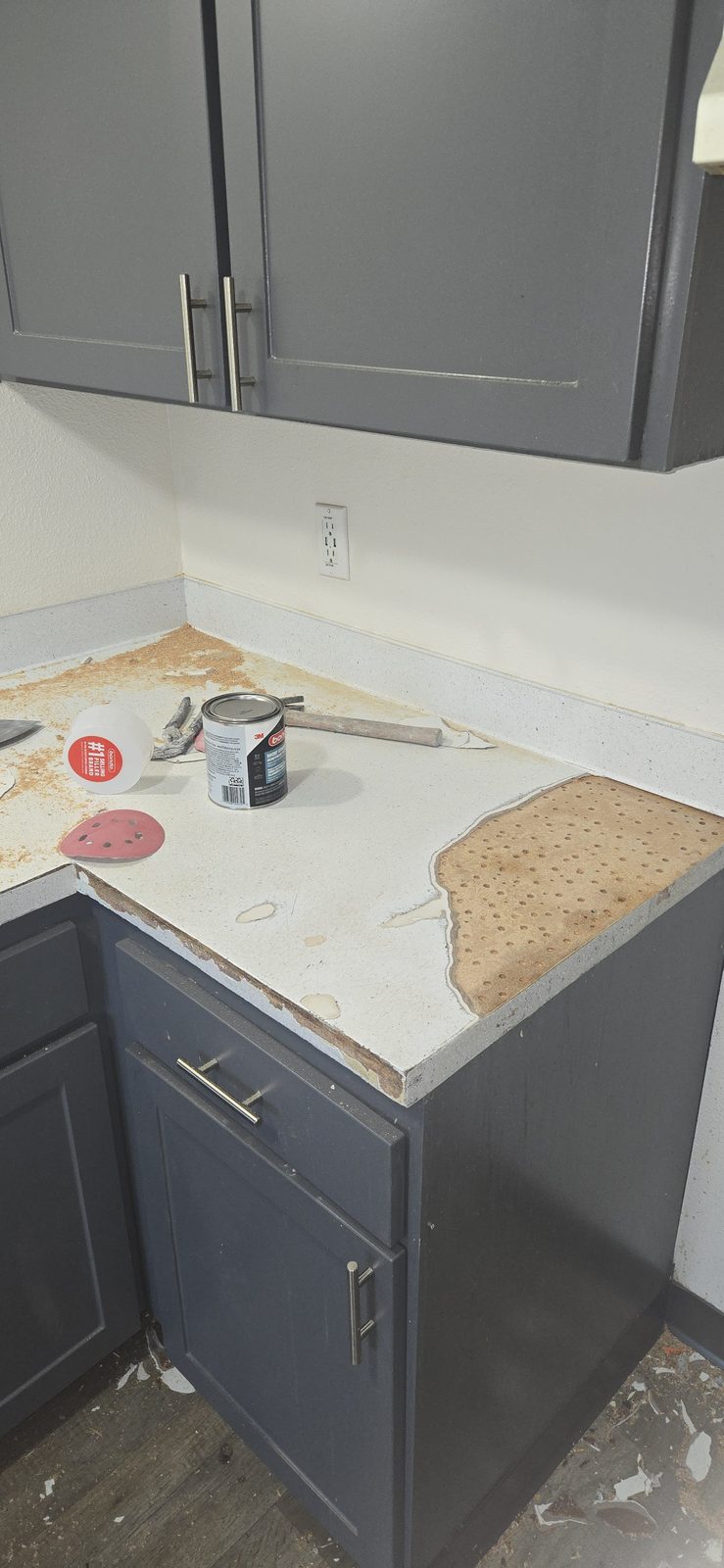 Damaged, peeling kitchen countertop before resurfacing — a real Oregon project by Resurface Oregon